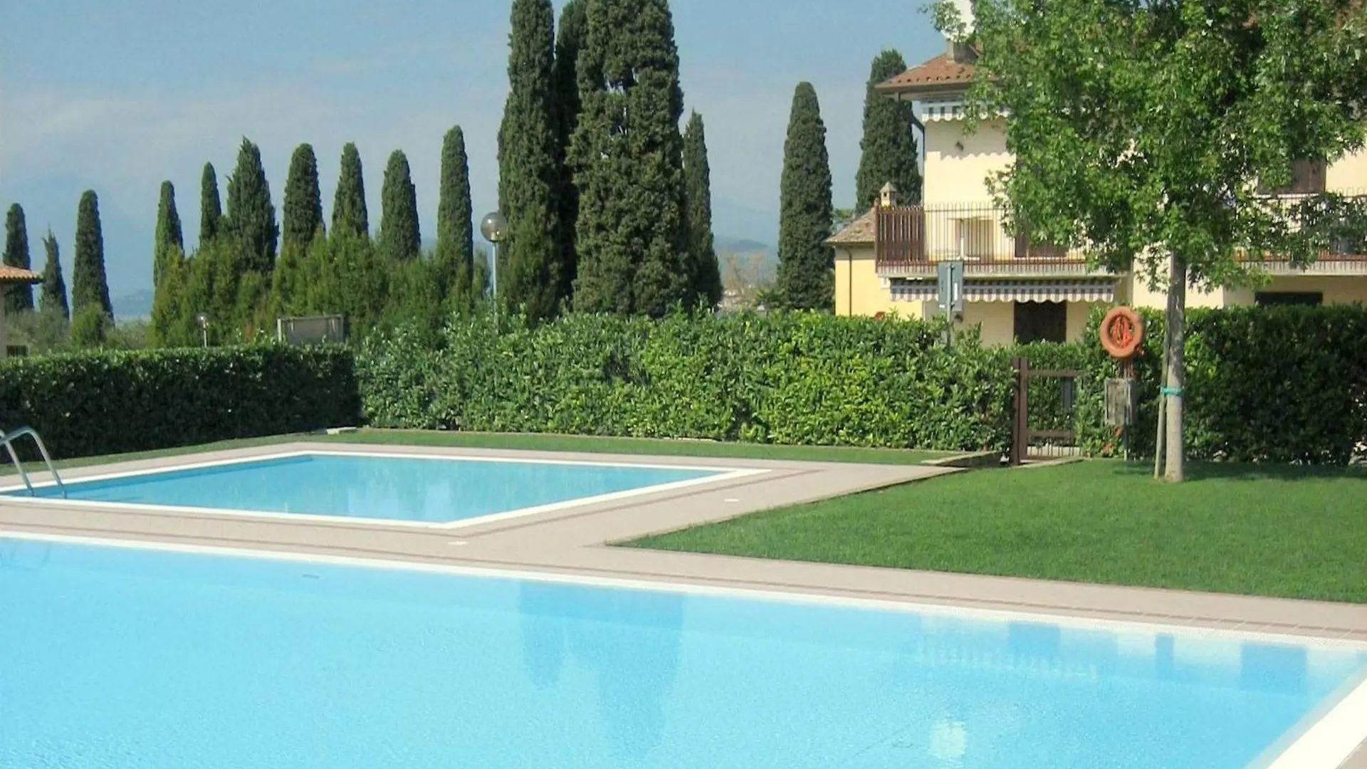 Enticing Holiday Home In Lazise With Swimming Pool